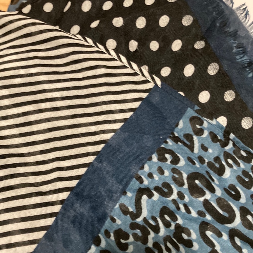 This designer blends these funky patterns to this scarf to offset your ensemble